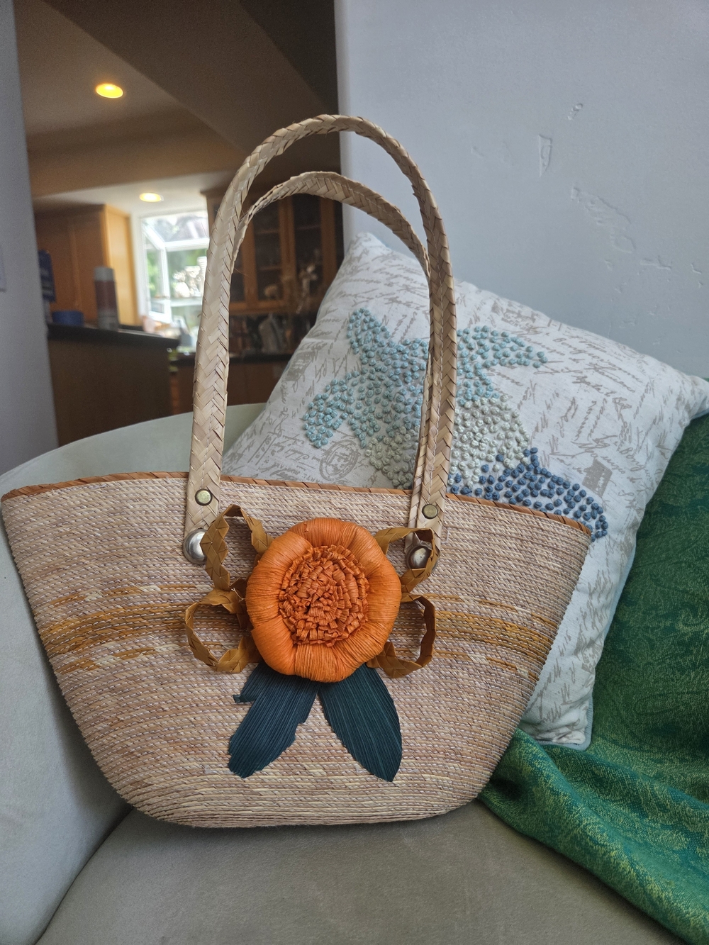 Handwoven Straw Tote with Orange Flower Accent